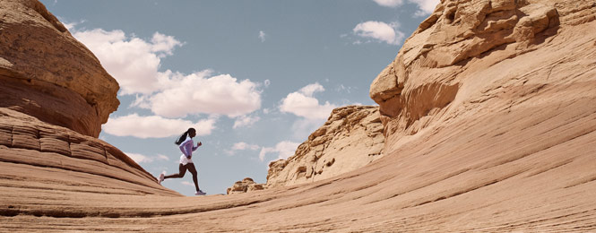 Woman Running in the Desert